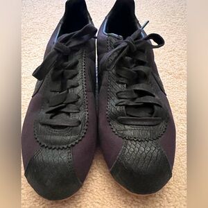 Women’s Black/Snake Nike Cortez sneakers like new.  Size 8.5